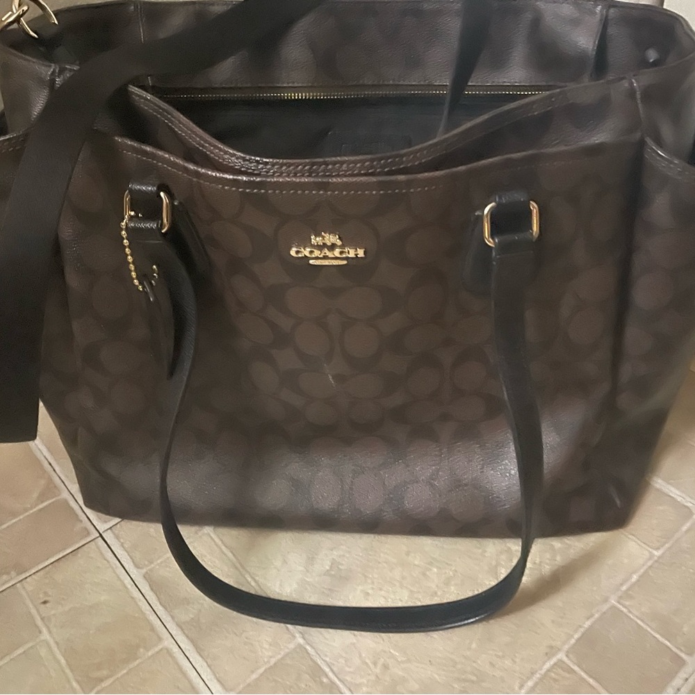 Color black and brown Coach diaper bag